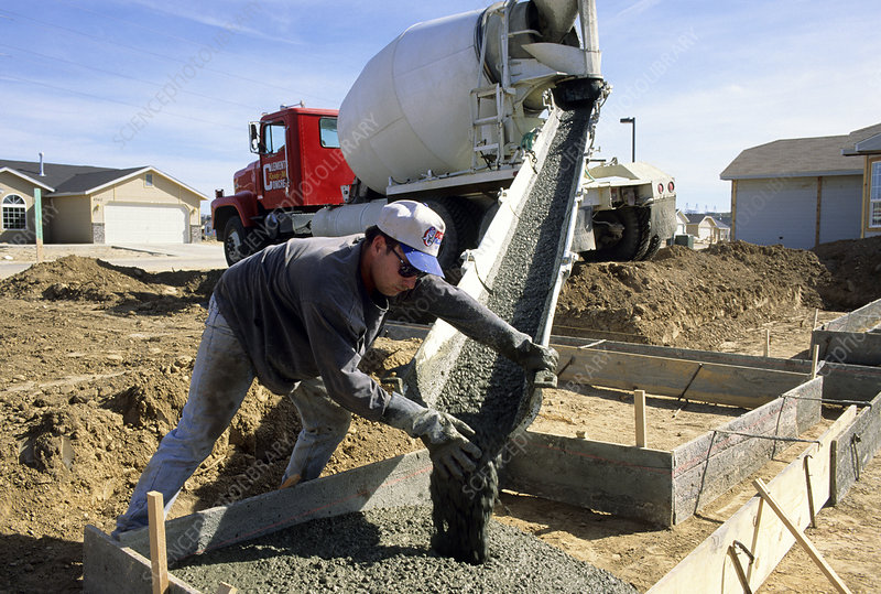 Concrete pouring at construction site